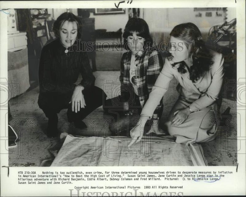 Load image into Gallery viewer, 1980 Press Photo American International's "How to Beat the High Cost of Living"
