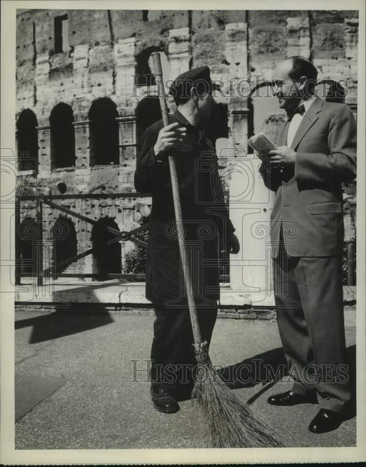 1961 Press Photo Irving R. Levine and a street sweeper in Rome, on NBC News.