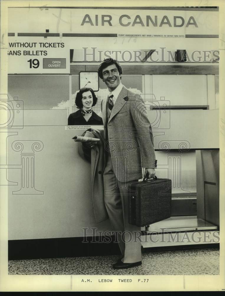Load image into Gallery viewer, 1977 Press Photo Man models Herringbone Jacket and Vest by A.M. Lebow Bros.
