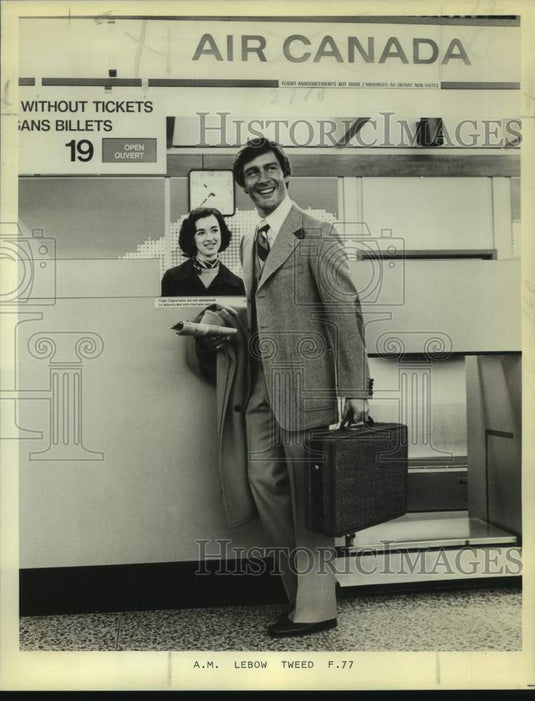 1977 Press Photo Man models Herringbone Jacket and Vest by A.M. Lebow Bros.