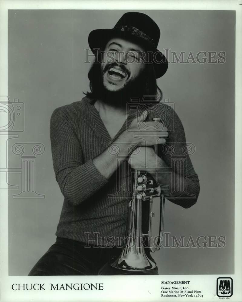 Load image into Gallery viewer, 1980 Press Photo Chuck Mangione, jazz flugelhorn player, trumpeter and composer.
