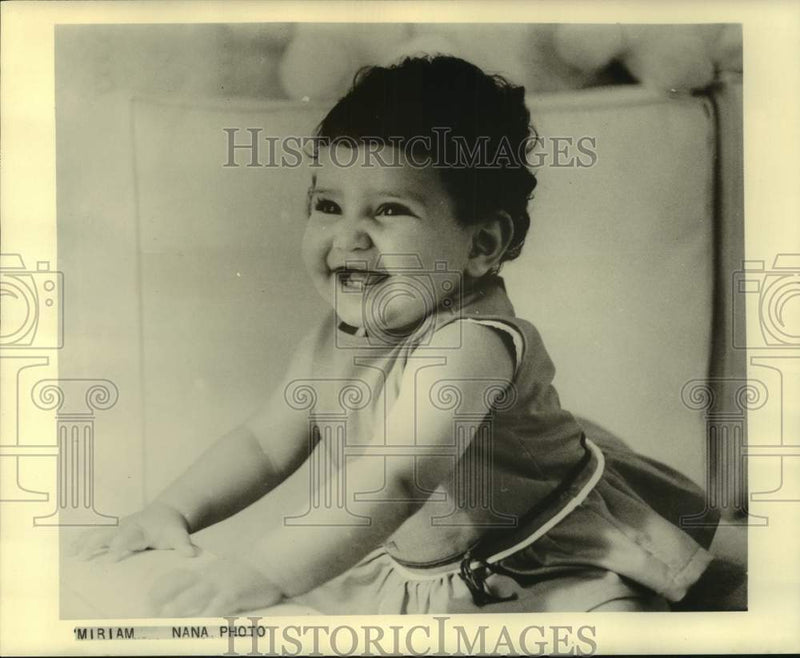 Load image into Gallery viewer, 1963 Press Photo Plump toddler Miriam, the daughter of King Hassan of Morocco.
