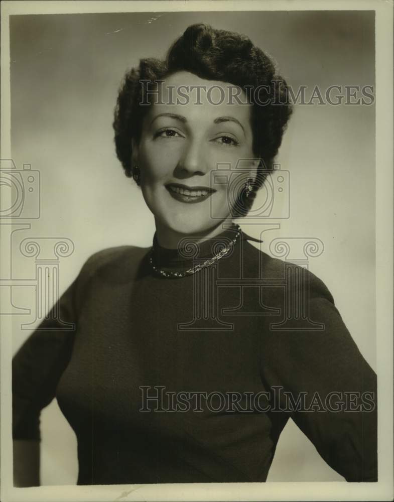 1952 Press Photo Lady smiles and pose for picture - nop58563