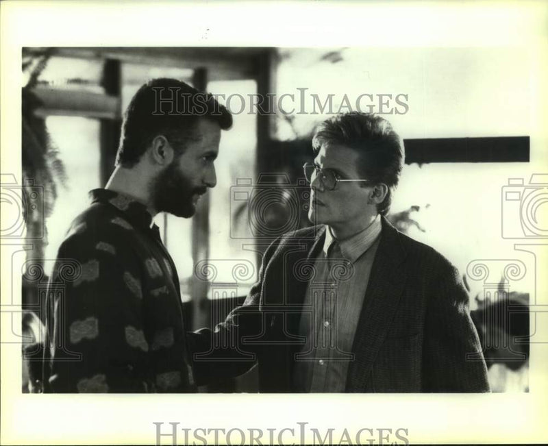 Load image into Gallery viewer, 1990 Press Photo Rick Rossovich and Doug Savant in "Paint It Black" - nop69366
