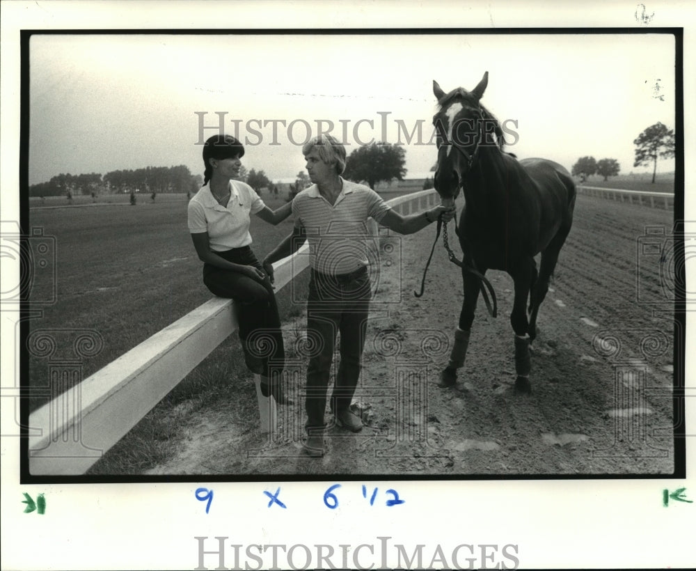 1983 Press Photo Patricia Schwarz and Barney Core with Fire Diplomat.- Historic Images