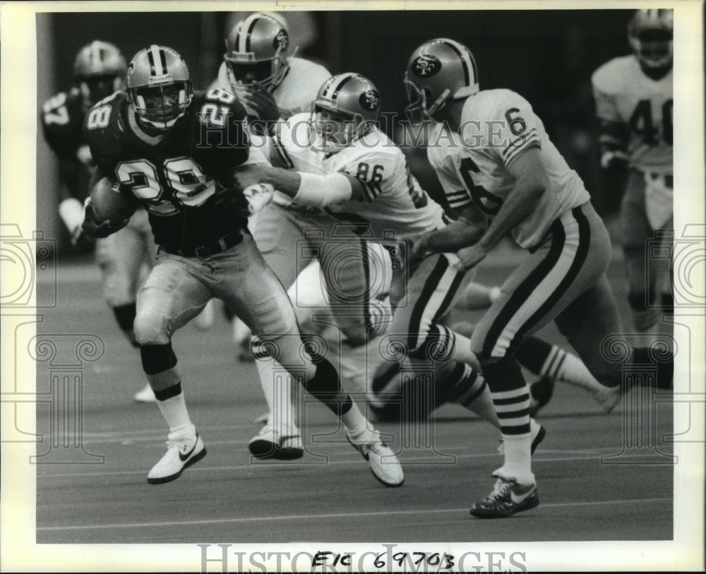 1989 Press Photo Football - Gene Atkins scrambles for long yardage during game- Historic Images