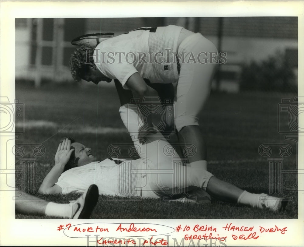 1988 Press Photo Saints' Morten Andersen and Brian Hansen during stretch drill.- Historic Images