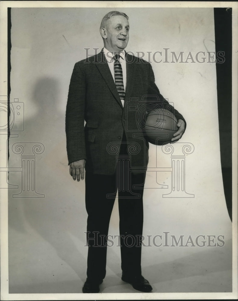 Press Photo Man wearing Suit holding Basketball - nos10057- Historic Images