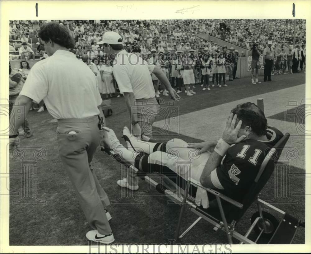 1989 Press Photo Injured New Orleans Saints football player John Fourcade- Historic Images