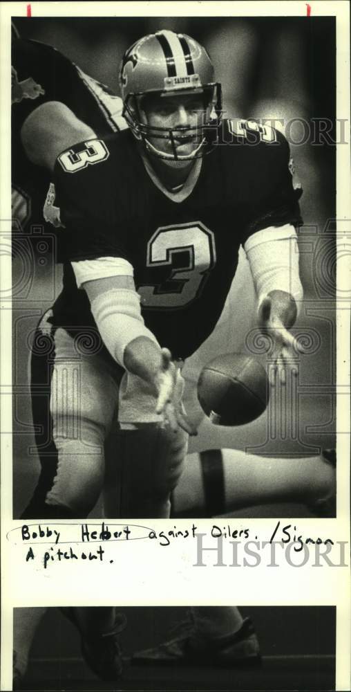 1987 Press Photo New Orleans Saints football player Bobby Hebert vs. Houston- Historic Images