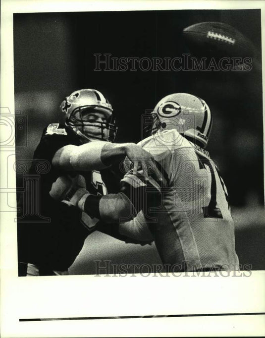 1988 Press Photo New Orleans Saints and Green Bay Packers play NFL football- Historic Images