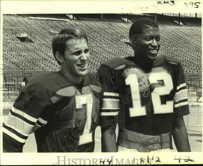 Load image into Gallery viewer, 1980 Press Photo Tulane football players Rock Hontas and Nickie Hall - nos15503
