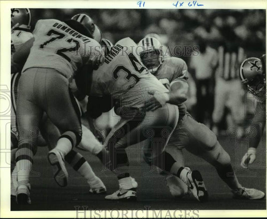 1990 Press Photo New Orleans Craig Heyward Tackled - nos15594- Historic Images