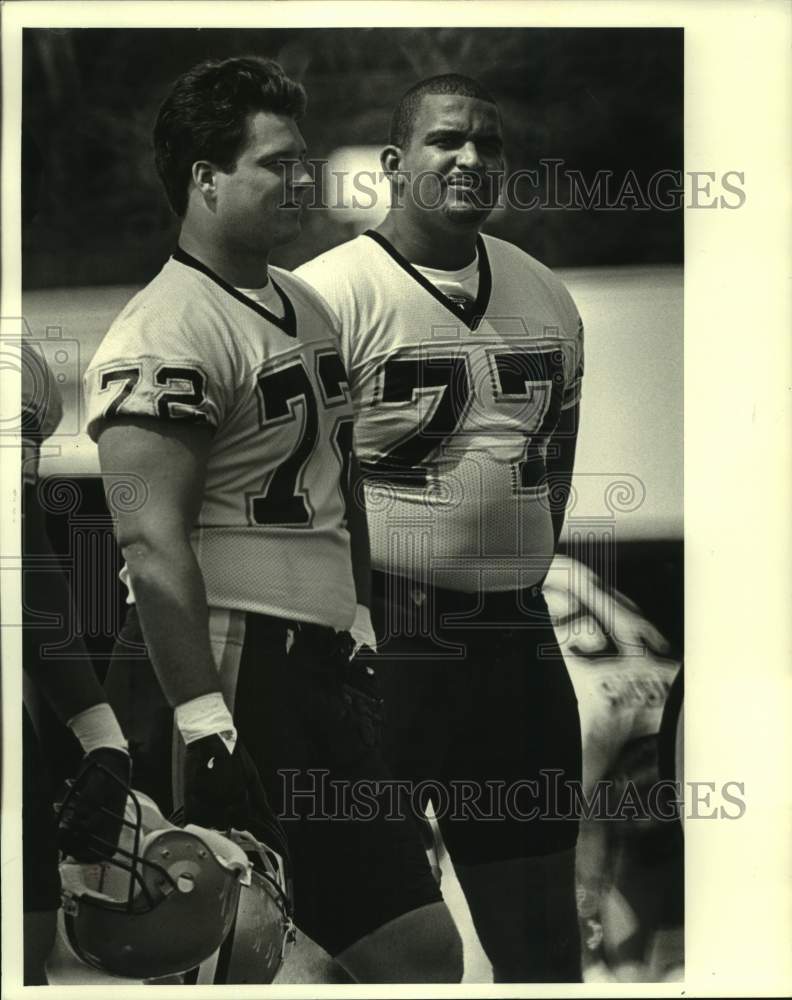 1986 Press Photo New Orleans Saints football player Daren Gilbert and teammate- Historic Images