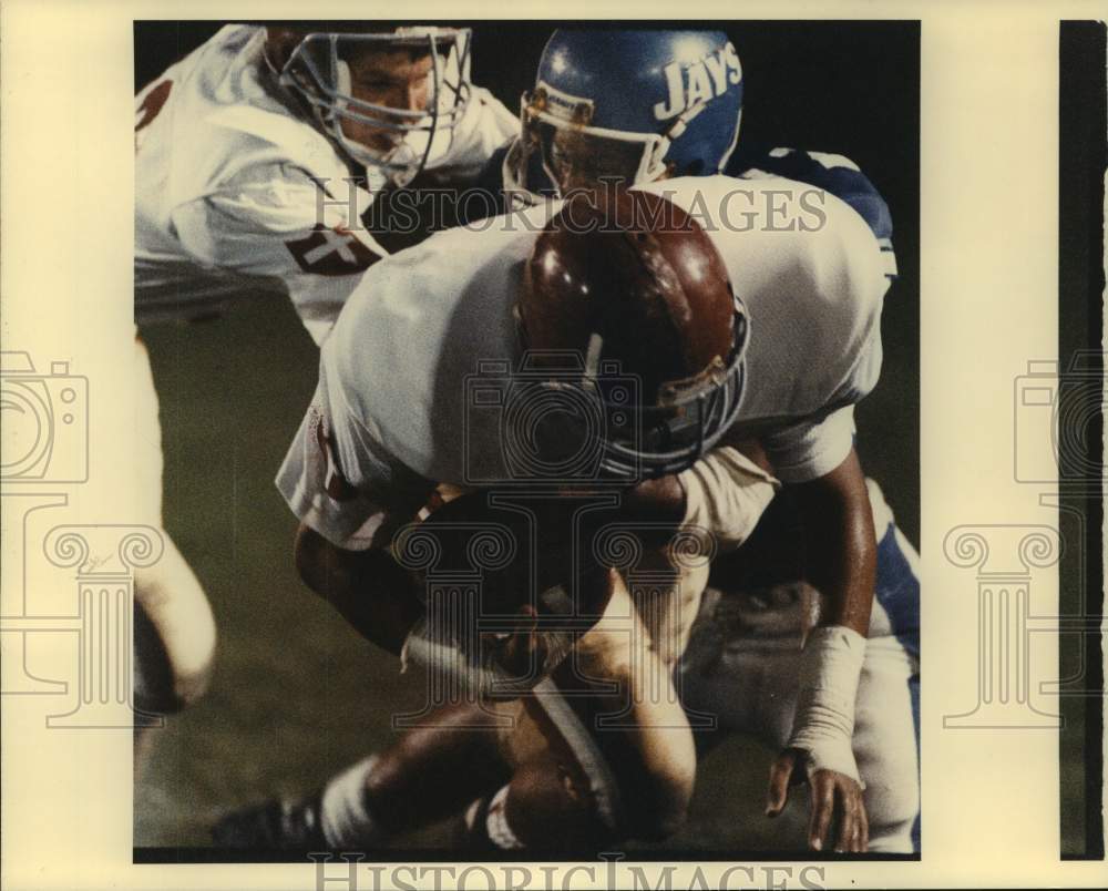 Press Photo Jesuit High football player in action - nos19026- Historic Images