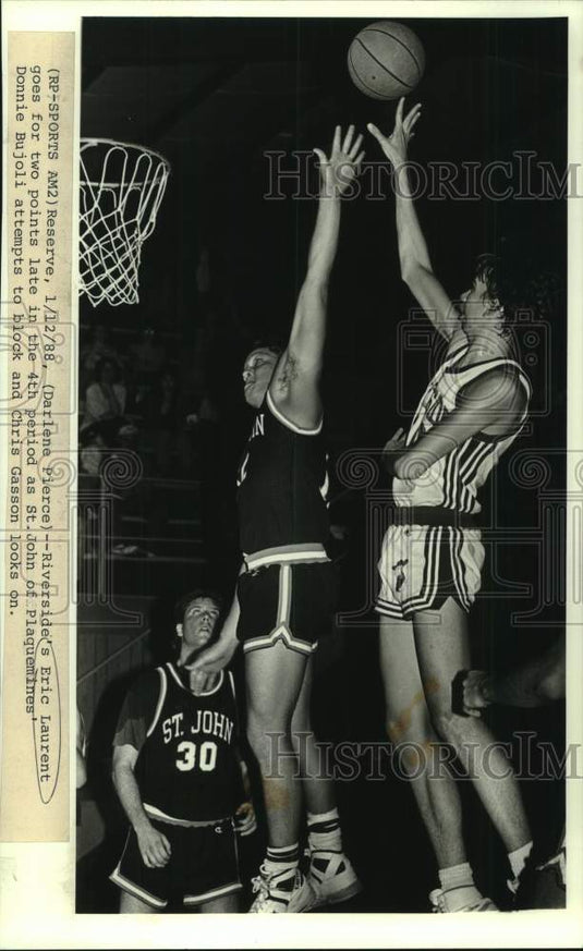 1988 Press Photo Riverside's basketball player Eric Laurent shoots over defender- Historic Images