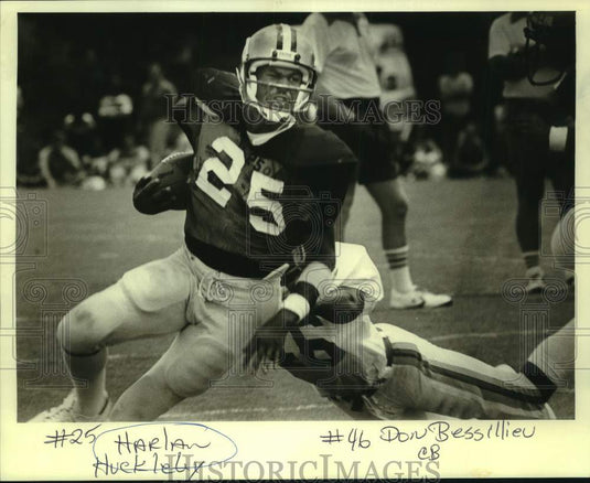 1980 Press Photo Football player Harlan Huckleby is tackled by Don Bessillieu- Historic Images