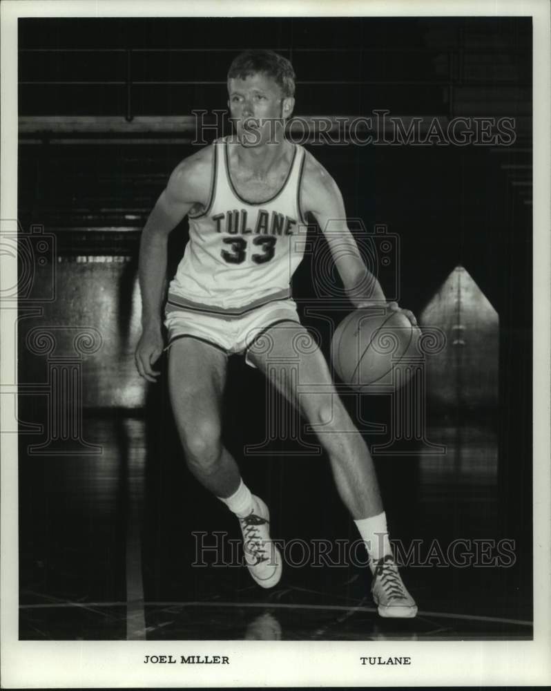 1966 Press Photo Tulane basketball player Joel Miller dribbles the ball on court- Historic Images