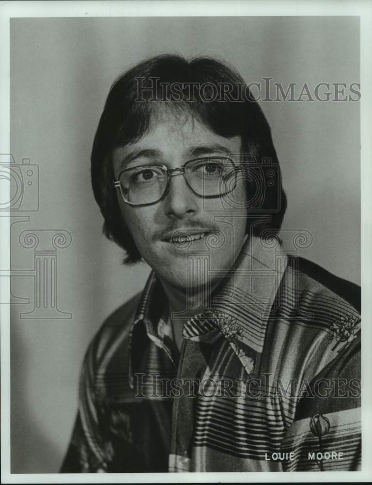 1977 Press Photo Bowler Louie Moore sits for publicity portrait - nos25180- Historic Images