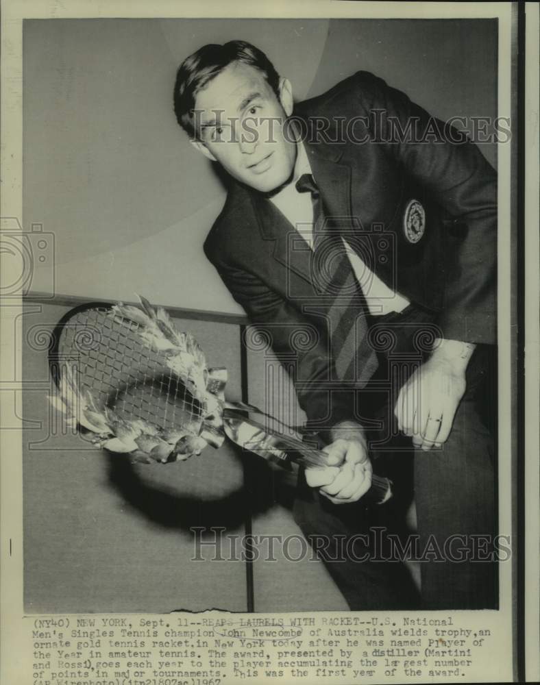 1967 Press Photo Tennis player John Newcombe holds ornate gold tennis racket- Historic Images