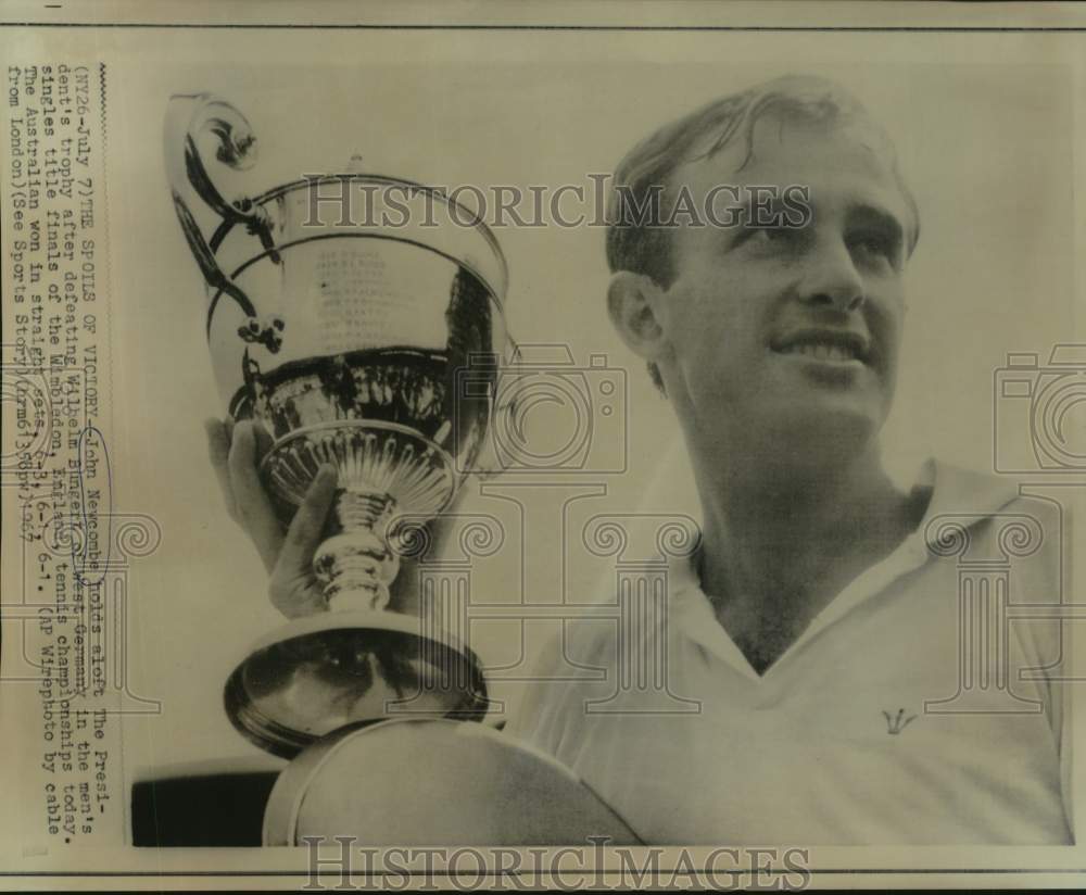 1967 Press Photo Australian tennis player John Newcombe holds Wimbledon trophy- Historic Images