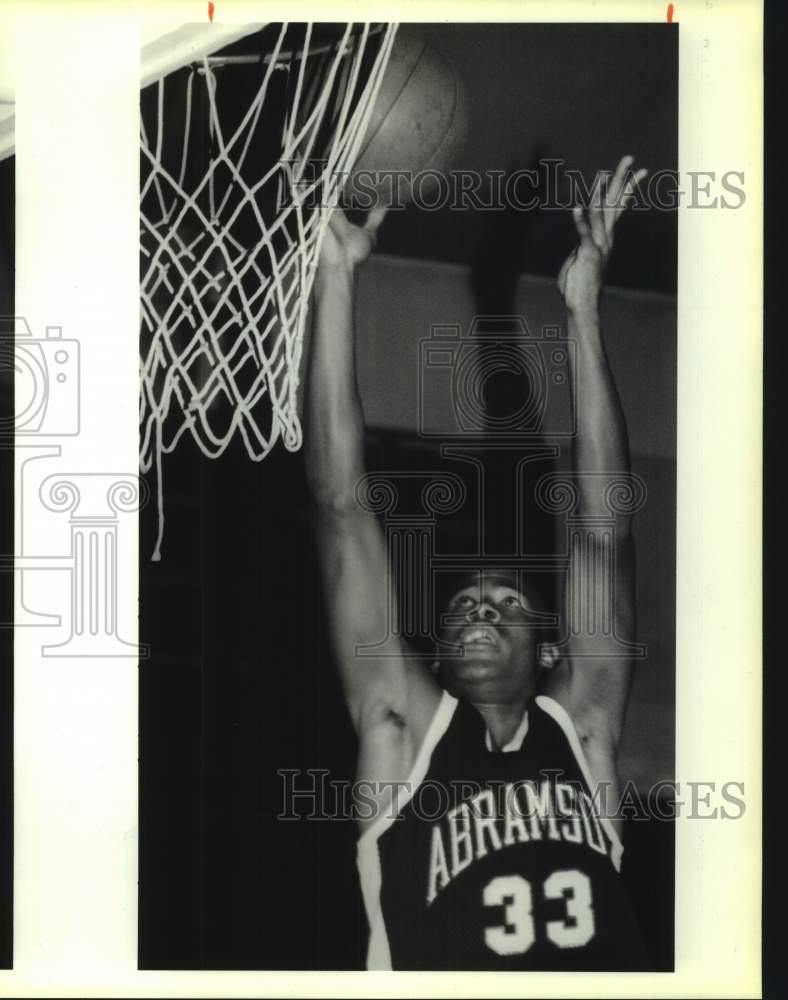 1990 Press Photo Abramson basketball player Ronald Nunnery #33 grabs rebound- Historic Images