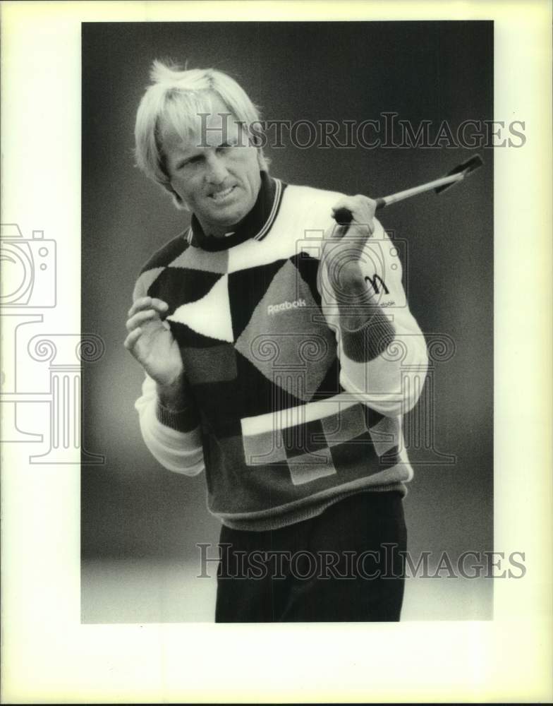 1989 Press Photo Golfer Greg Norman grimaces after missing putt at USF&amp;G in NO- Historic Images