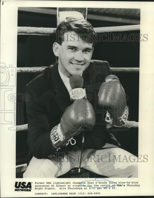 1989 Press Photo Former WBA boxing champion Sean O'Grady sits in ring for promo- Historic Images