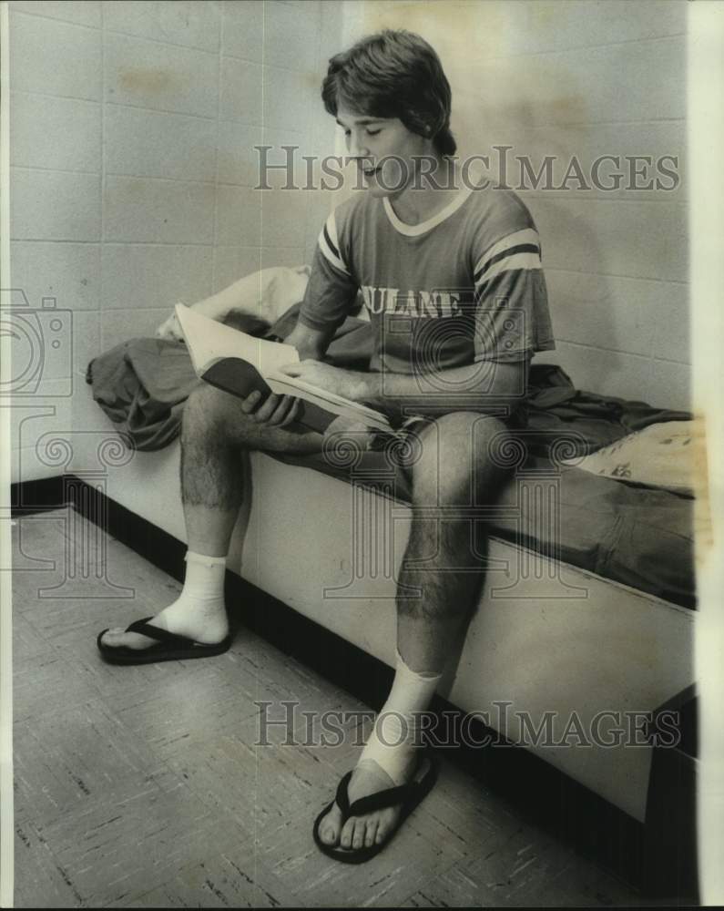 1976 Press Photo Football - Mike Price of Tulane Checks Playbook - nos28831- Historic Images