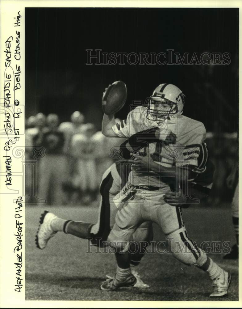 1988 Press Photo Newman football quarterback John Randle is sacked by defender- Historic Images