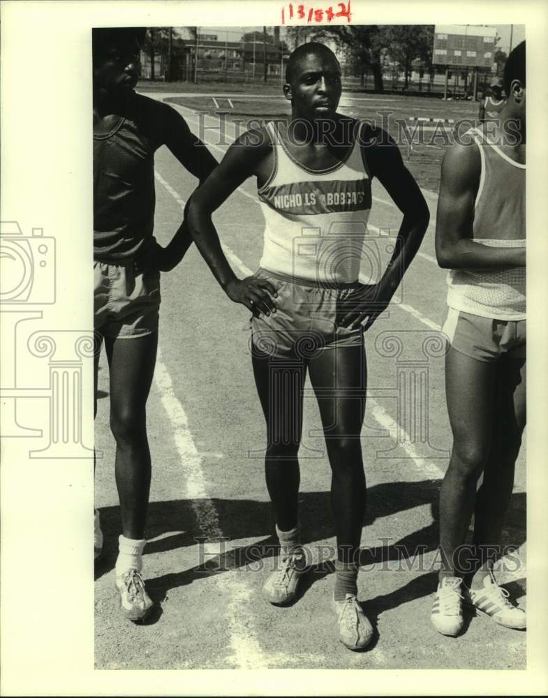 1984 Press Photo Nicholls track athlete Darryl Prevost stands on track- Historic Images