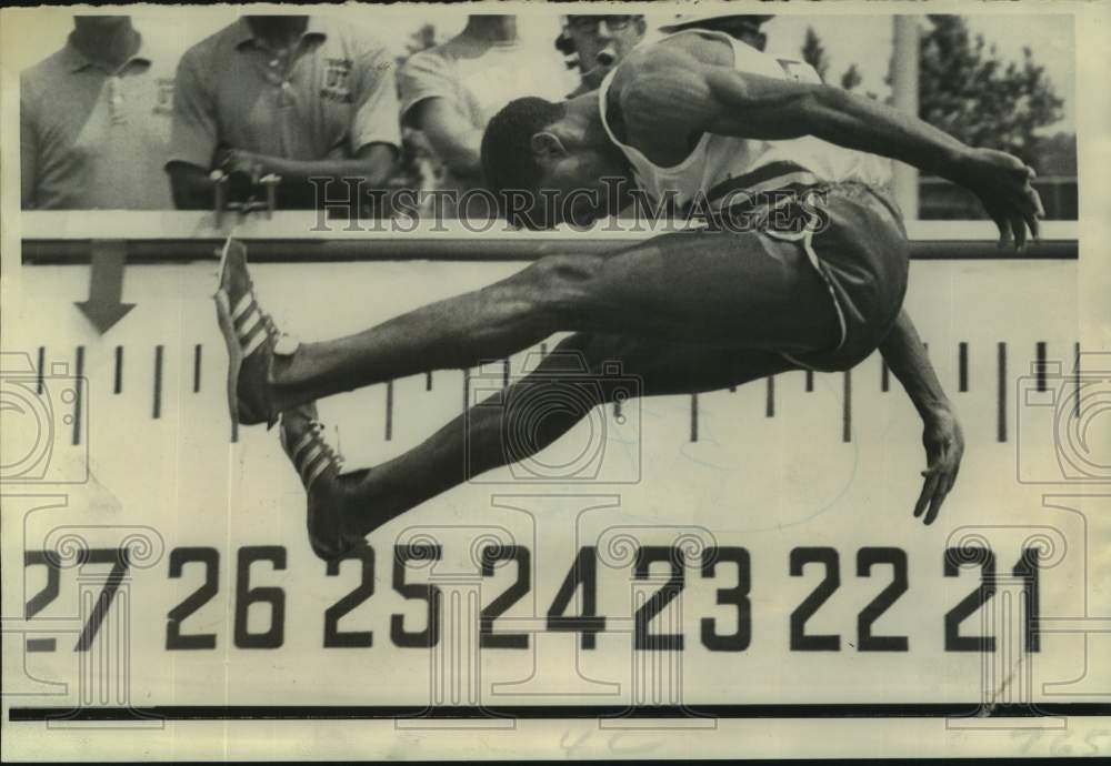 1969 Press Photo Jerry Proctor long jumps during NCAA Track championship in TN- Historic Images