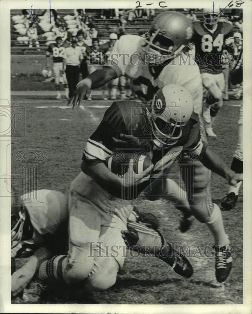 1973 Press Photo Shaw football halfback Jim Cramond gets tackled by St Augustine- Historic Images