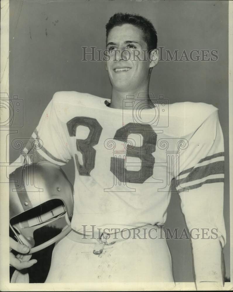 Press Photo McDonogh football player Otto Potier stands and holds his helmet- Historic Images