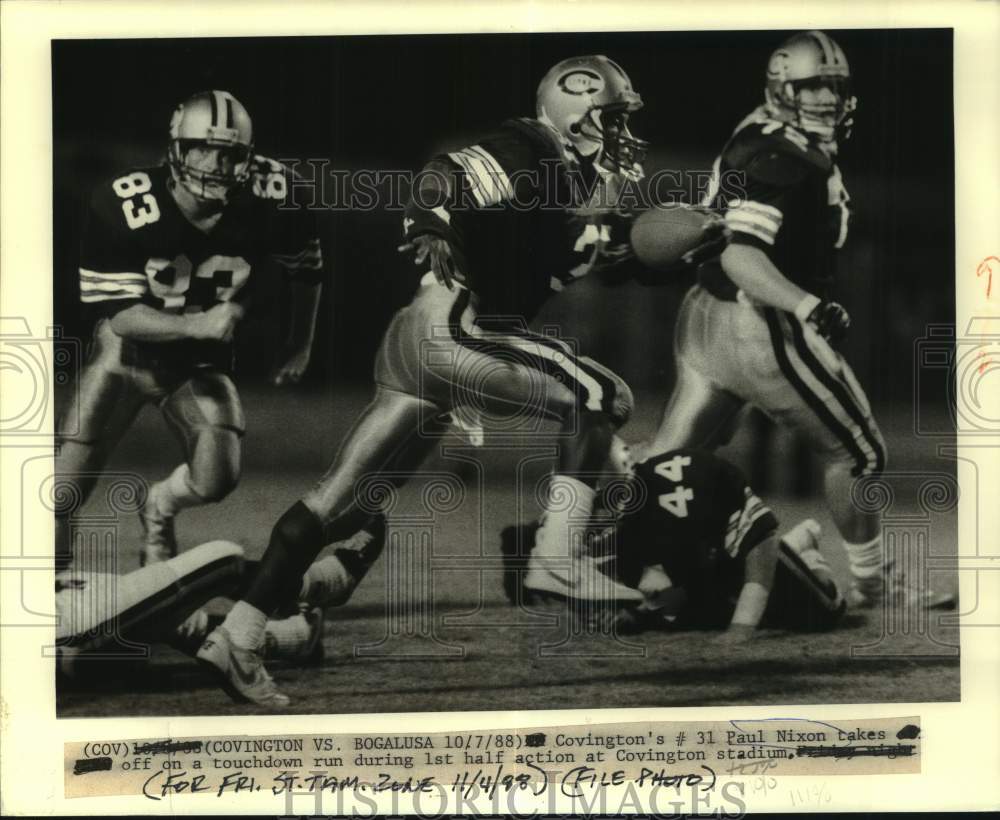 1988 Press Photo Covington football player Paul Nixon runs with the ball in game- Historic Images