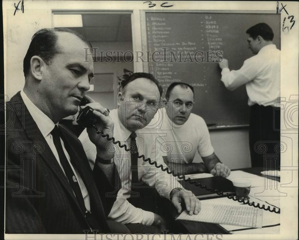 1969 Press Photo New Orleans Saints football general manager Vic Schwenk listens- Historic Images