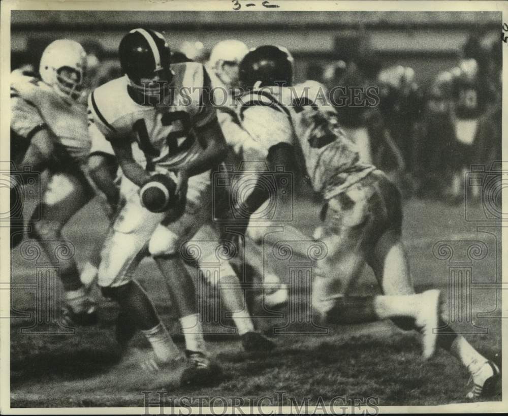 1971 Press Photo St Augustine football quarterback hands off to running back- Historic Images