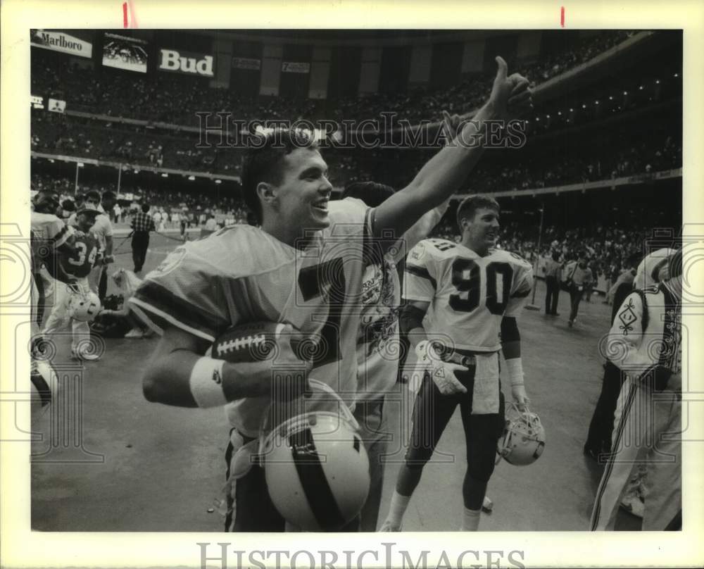 1990 Press Photo Miami college football players celebrate - nos31625- Historic Images