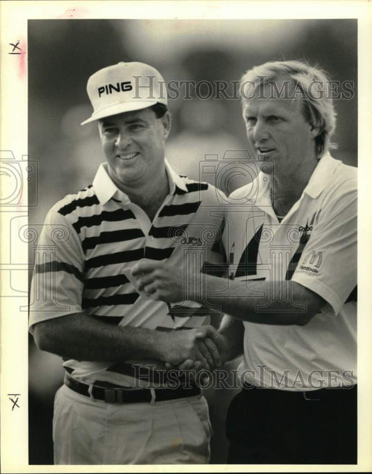 1989 Press Photo Tim Simpson, Greg Norman Shake Hands After Golf Match- Historic Images