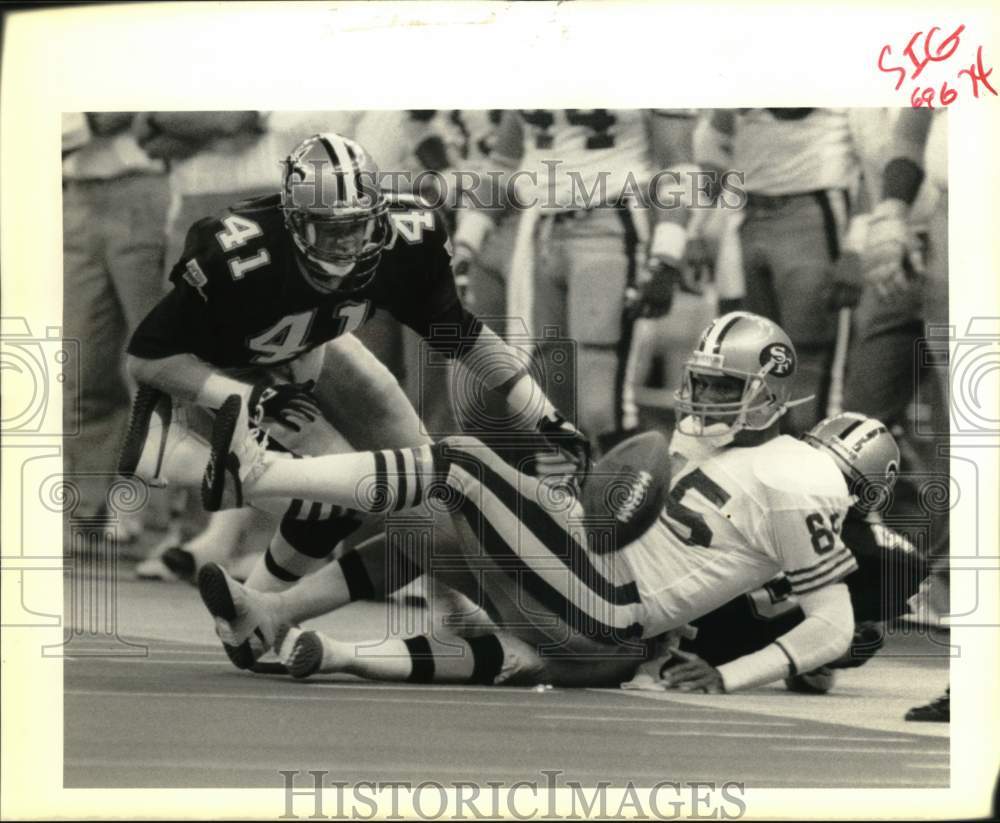 1989 Press Photo New Orleans Saints vs. San Francisco 49ers Football - nos32788- Historic Images