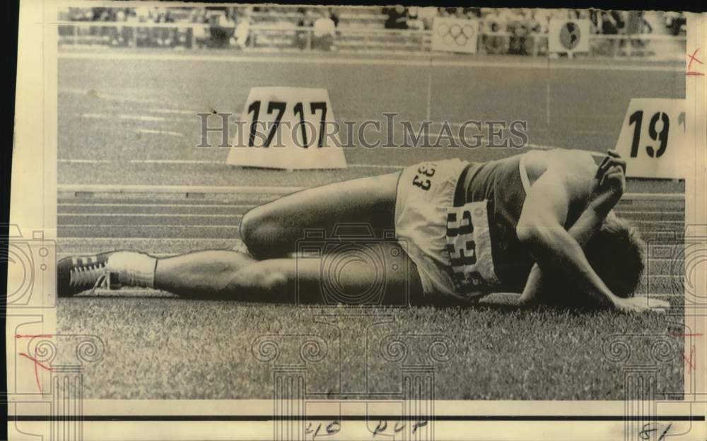 1972 Press Photo Runner Jim Ryun Lying on Ground - nos34085- Historic Images