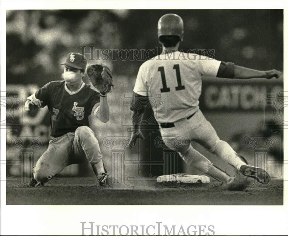 1986 Press Photo Ted Wood, UNO Baseball Player, Sliding During Game - nos34416- Historic Images