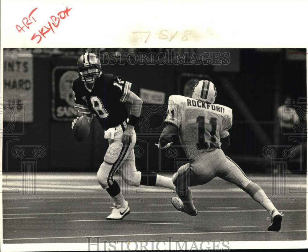 1985 Press Photo New Orleans Saints Quarterback Dave Wilson and Opponent- Historic Images