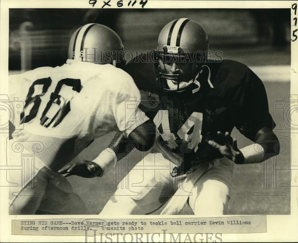 1981 Press Photo Saints&#39; Dave Wayner tackles teammate Kevin Williams in drills- Historic Images