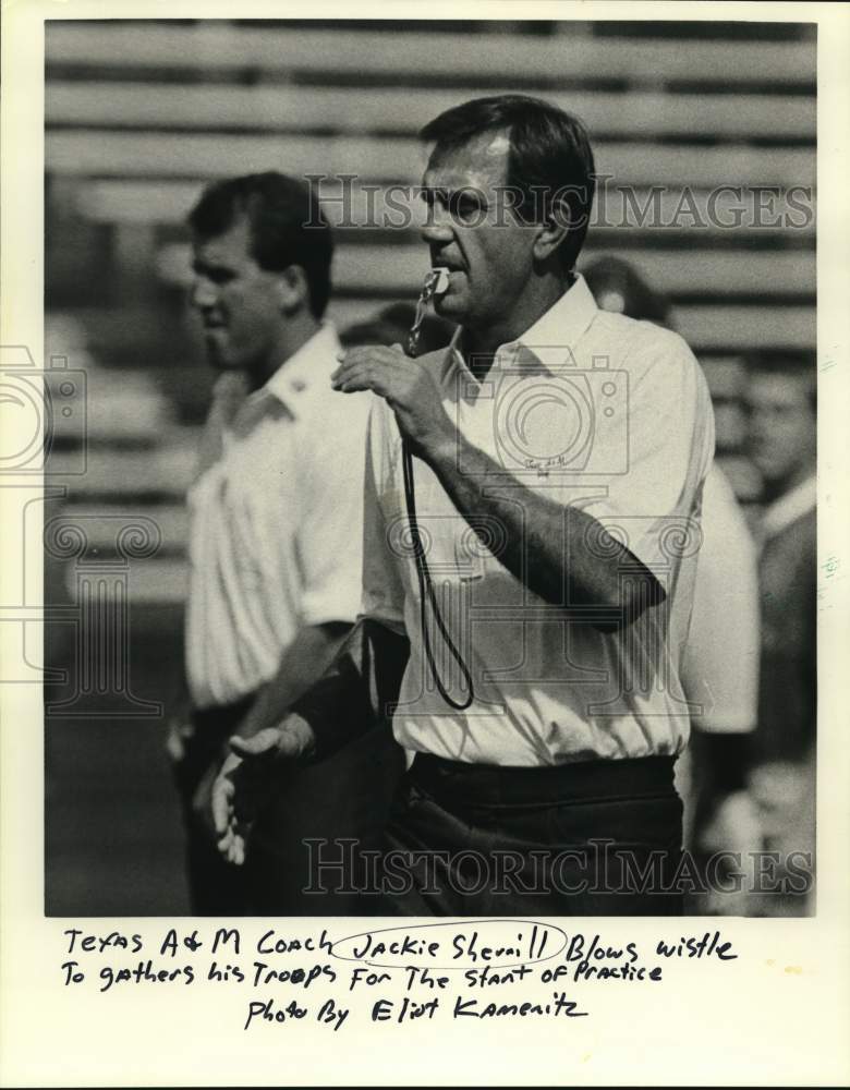 1987 Press Photo Texas A&amp;M coach Jackie Sherrill blows whistle start practice.- Historic Images