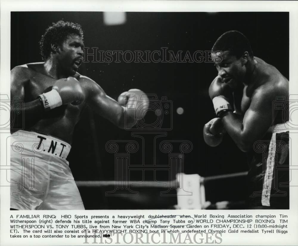 1988 Press Photo Boxers Tim Witherspoon, Tony Tubbs in Ring Action - nos36224- Historic Images