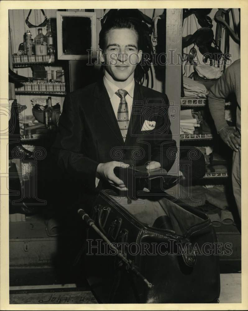 1965 Press Photo Horse Jockey Robert Ussery in Tack Room - nos37142- Historic Images