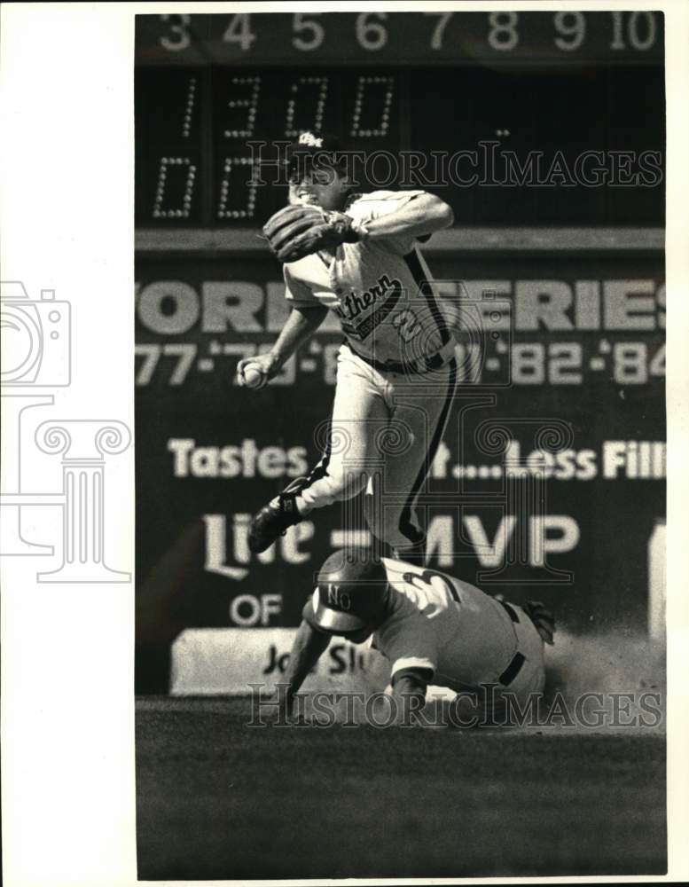 1987 Press Photo University of Southern Mississippi Baseballer Knocked off Feet- Historic Images