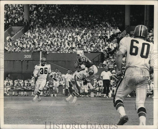 1968 Press Photo Colts' Willie Richardson tackled by Falcon Football Player- Historic Images