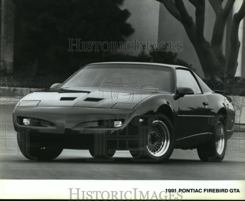 1990 Press Photo Font Hood and Side of the 1991 Pontiac Firebird GTA Automobile- Historic Images